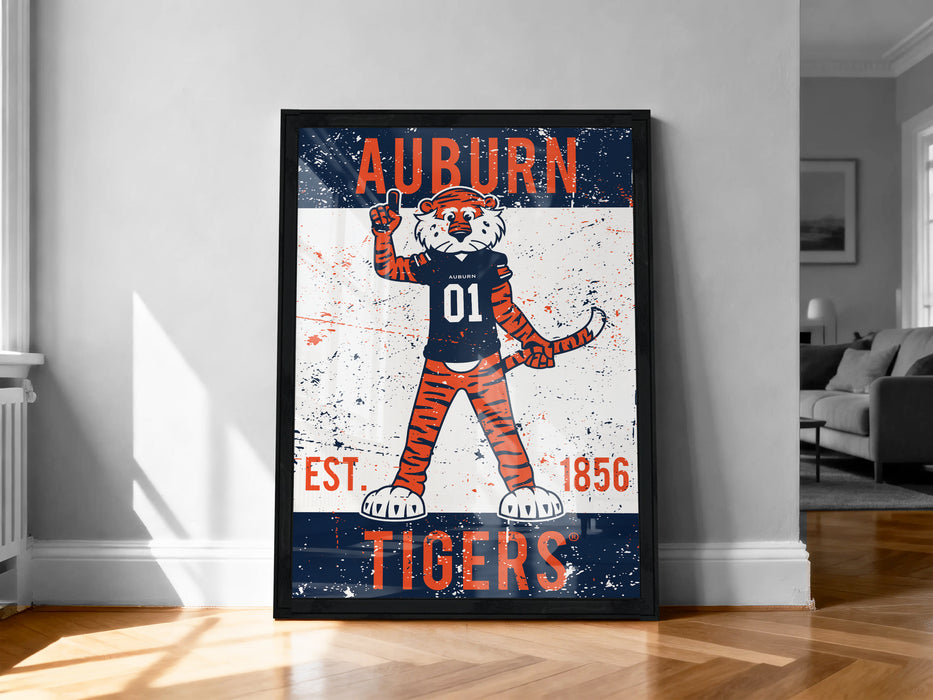 a framed poster of an animated tiger character with the text "Auburn Tigers" and "Est. 1856" printed on it.