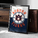 A framed poster with the text "AUBURN TIGERS" and a basketball logo, placed on a carpeted floor next to a wooden chest.
