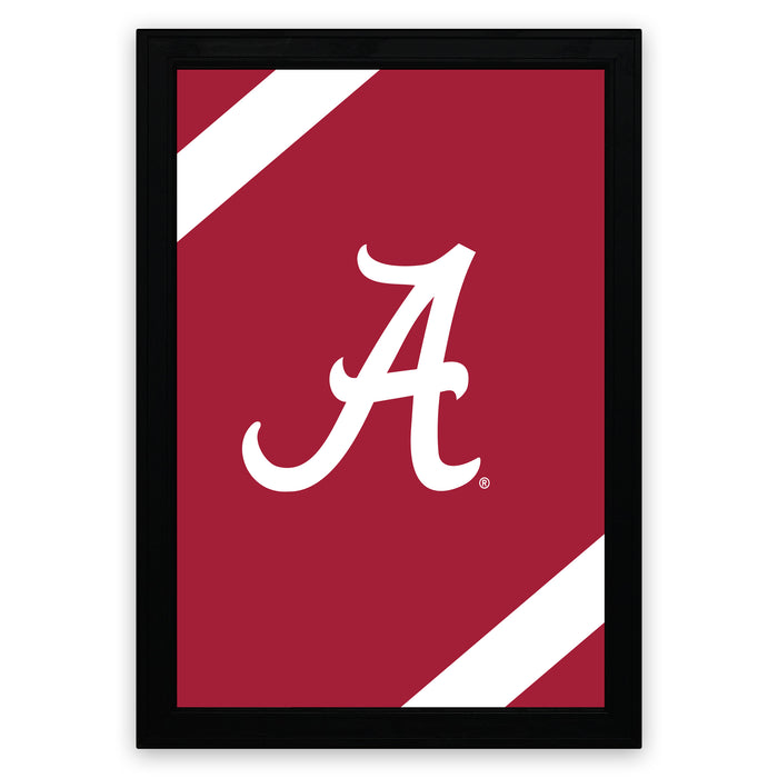 a framed poster with a red background and a white diagonal stripe. The poster prominently displays the letter "A" in a stylized font.