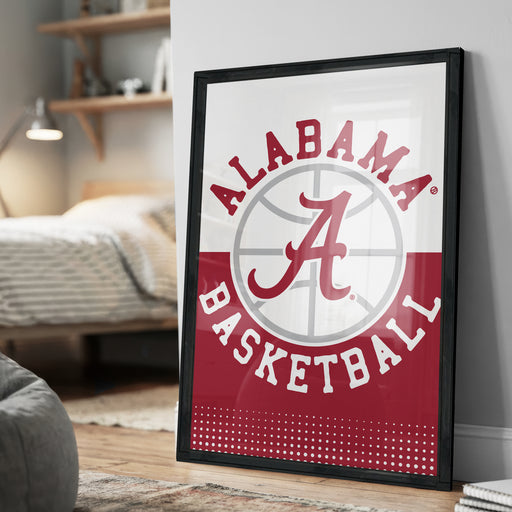 A framed poster of the Alabama basketball team logo is displayed on a wall in a bedroom.