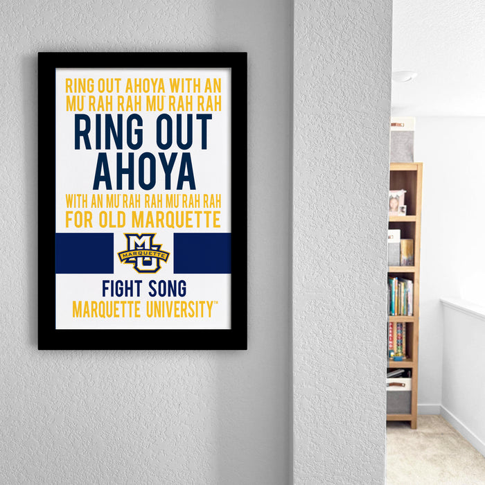 a framed poster with text and logos, hanging on a wall in a room.