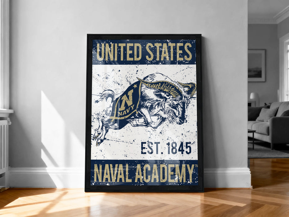 A framed poster of a naval emblem, with text that reads "UNITED STATES NAVAL ACADEMY EST. 1845".