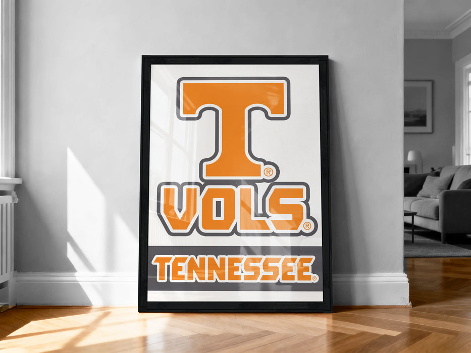 A framed poster with the word "TENNESSEE" and the logo of the Tennessee State University (TSU) is displayed on a wall in a room.