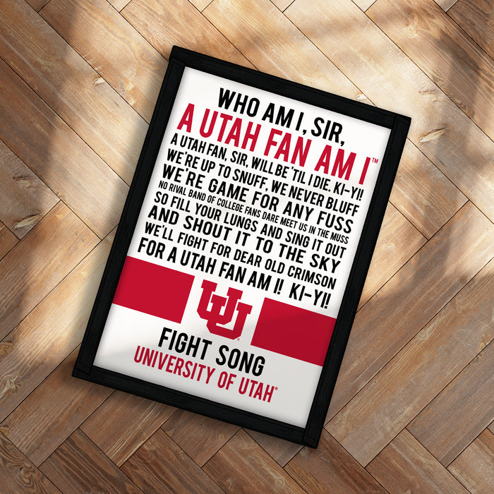 A framed poster with text, likely a fan quote or message, displayed on a wooden surface.