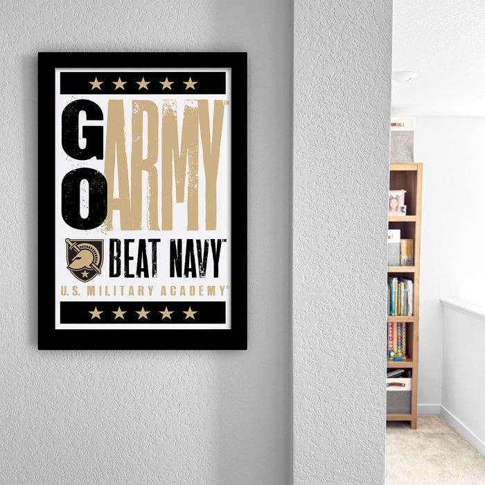 a framed poster with the text "GO ARMY BEAT NAVY" and a military insignia, hanging on a wall.