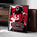A framed poster of a man wearing a Nebraska football hat, with the text "NEBRASKA FOOTBALL" prominently displayed.