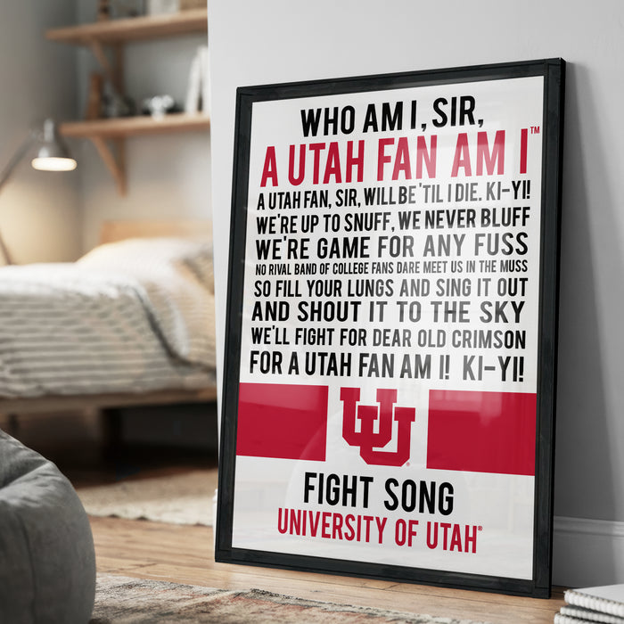 A framed poster with text, likely a humorous or motivational message, is displayed on a wall in a room.