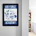 a framed poster of an Air Force Academy mascot, which is a bird-like creature with wings and a sword.