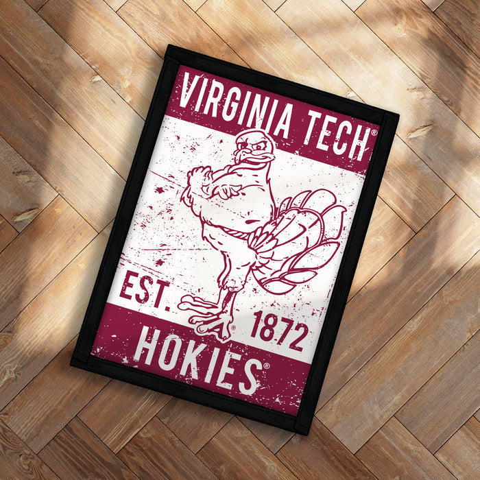 A framed poster featuring a turkey and the text "VIRGINIA TECH EST. 1872 HOKIES"