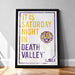 A framed poster with text and a tiger logo, promoting a Saturday night event at Death Valley.