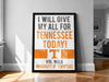 A framed poster with the text "I WILL GIVE MY ALL FOR TENNESSEE TODAY!" displayed on a wall.
