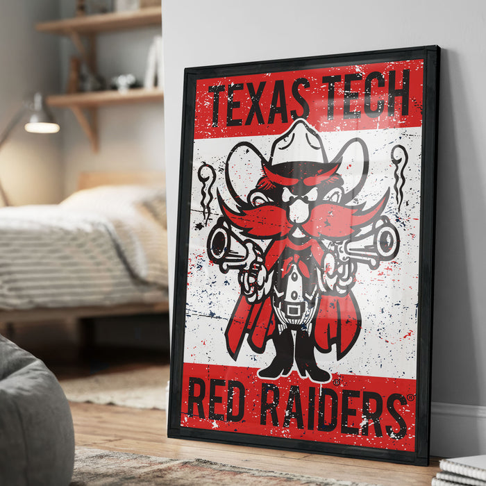A framed poster featuring a cartoon character with a cowboy hat and gun, representing the Texas Tech Red Raiders.