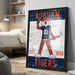 a framed poster of an animated tiger character, likely representing the Auburn Tigers, with the text "Auburn" and "Est. 1856" prominently displayed.