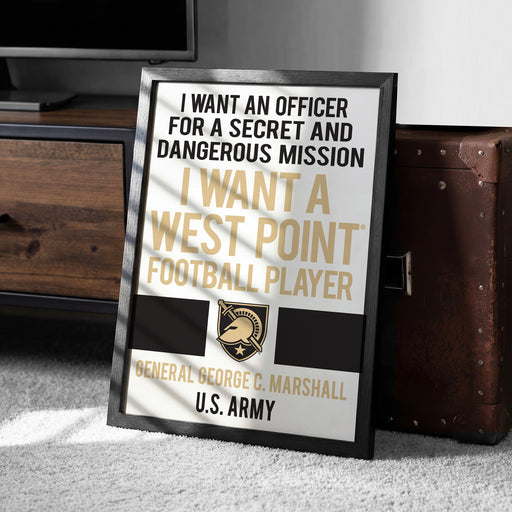 a framed poster with a message about wanting an officer for a secret and dangerous mission, stating that the poster is for a West Point Football Player.