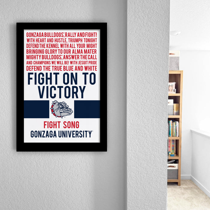 The image is a framed poster with text and a logo, hanging on a wall.