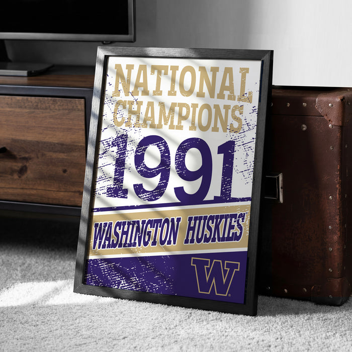 A framed poster celebrating the 1991 Washington Huskies' national championship victory, with the team's logo prominently displayed.