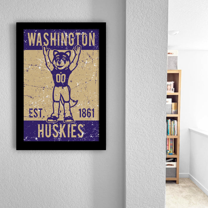 a framed poster of a mascot wearing a jersey with the text "WASHINGTON EST. 1861 HUSKIES" on it.