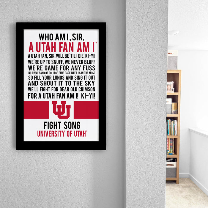 a framed poster with text on it, hanging on a wall next to a bookshelf.
