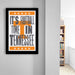 A framed poster with the text "IT'S FOOTBALL TIME IN TENNESSEE" is hanging on a wall.