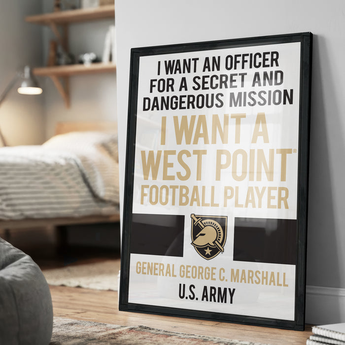 a framed poster with a message about wanting an officer for a secret and dangerous mission, stating that the poster is for a West Point football player.
