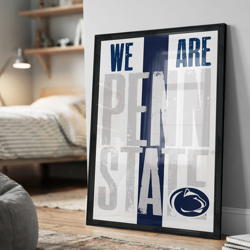A framed poster with the text "WE ARE PENN STATE" displayed prominently, along with the Penn State logo.
