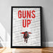 A framed poster with the text "GUNS UP" prominently displayed in large red letters, along with a graphic of a person riding a motorcycle.