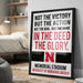 a framed poster with a motivational quote about Nebraska, placed on a wooden floor in a bedroom setting.