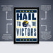 The image is a framed poster featuring the Michigan Wolverines football team, with a focus on the team's name and the phrase "Hail to the Victors". The poster is described as " Officially licensed" and "Premium printed", indicating that it is a high-quality, professionally printed poster. The poster is also described as "Shipped flat" and "The perfect gift", suggesting that it is a thoughtful and practical gift option.
