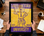 A framed poster of a tiger mascot from Louisiana State University, with the text "LOUISIANA STATE EST. 1860 UNIVERSITY" printed on it.