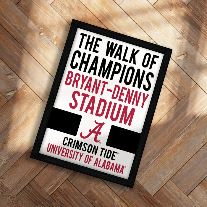 The image is a framed poster advertising "The Walk of Champions" at the "Bryant-Denny Stadium" at the "University of Alabama", featuring the word "A" in red.