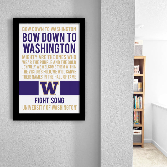a framed poster with text that reads "BOW down to Washington, WASHINGTON, WASHINGTON, W" and "FIGHT SONG UNIVERSITY OF WASHINGTON".