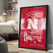 A framed poster of the Nebraska Huskies basketball team, featuring the team's logo and text.