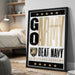 A framed poster with the text "GARMY BEAT NAVY" and a U.S. Military Academy logo, displayed on a wall in a bedroom setting.