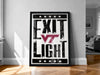 A framed poster with the text "EXIT LIGHT" and a Virginia Tech (VT) logo, displayed on a wall in a room.