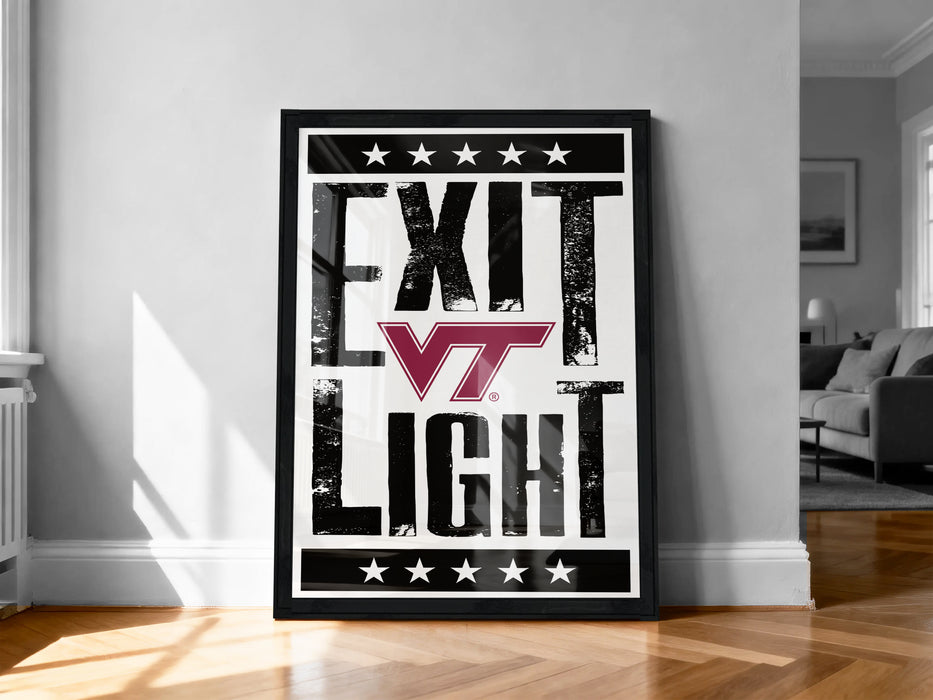 A framed poster with the text "EXIT LIGHT" and a Virginia Tech (VT) logo, displayed on a wall in a room.