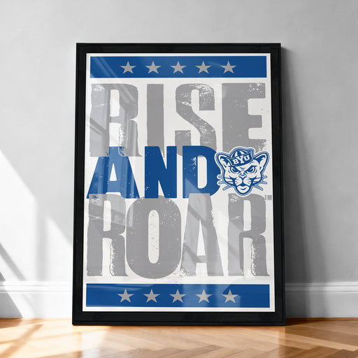 The image is a framed poster with the text "RISE AND ROAR" prominently displayed.