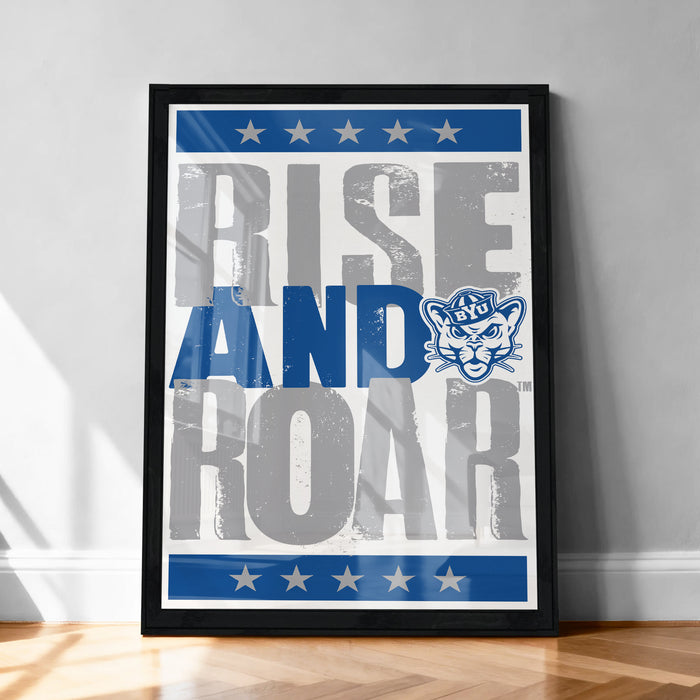 The image is a framed poster with the text "RISE AND ROAR" prominently displayed.