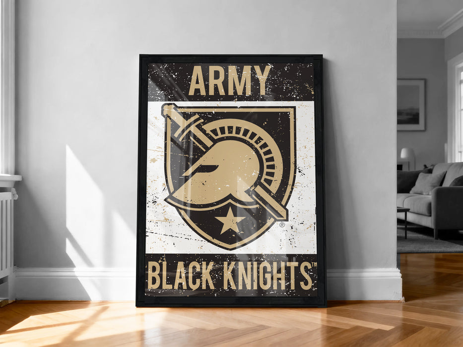 A framed poster of the Army Black Knights logo is displayed on a wall in a room.