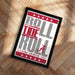A framed poster with the text "ROLL TIDE RUM" and "ALABAMA CRIMSON TIDE" printed on it, placed on a wooden floor.
