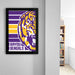 a framed poster of the LSU (Louisiana State University) logo, which is a stylized tiger with yellow and purple stripes.